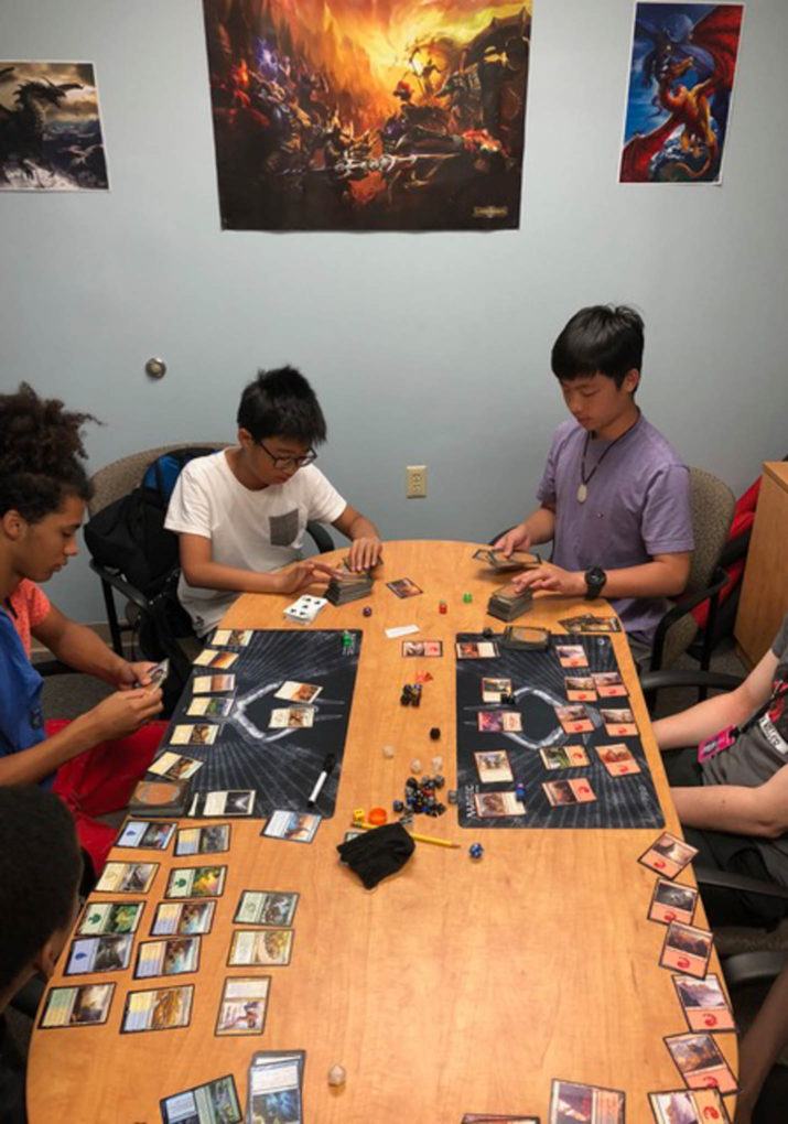 Group of boys playing a table top role playing game