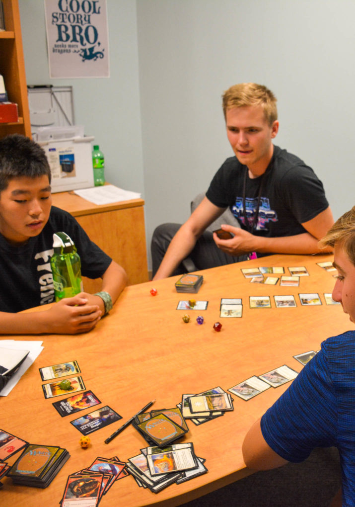 Campers playing a tabletop rpg