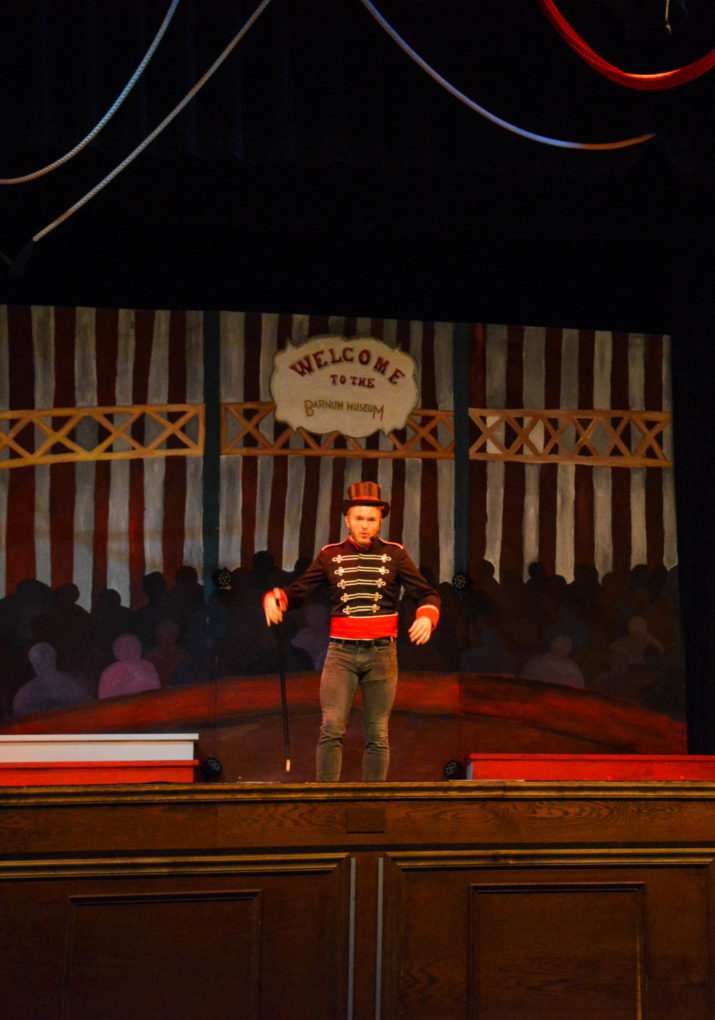 Male camper performing a scene on stage