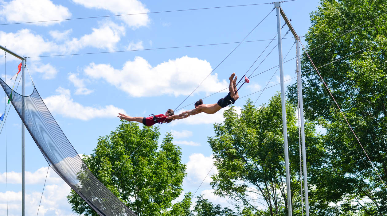 Campers flying on the trapeze rig