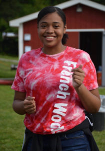 Girl in a pink FWSAC shirt