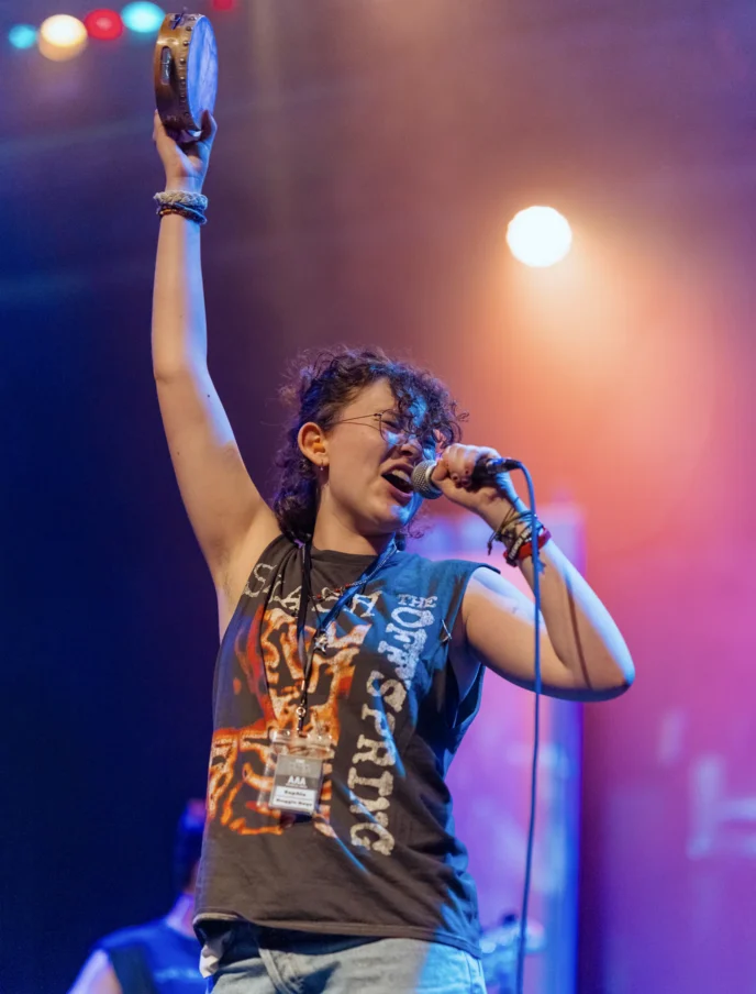 Teen musicians performing in a rock show at New York Teen Camp